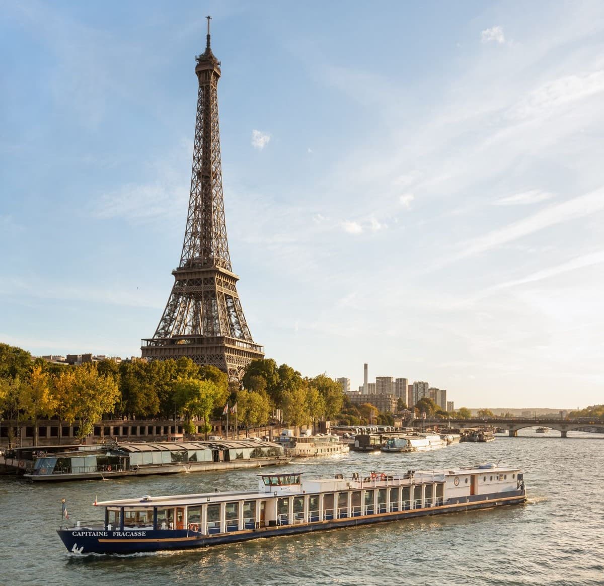 Sightseeing boat passing along the Seine in Paris